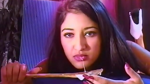 Vintage 90',s Indian Starlet Nadia Nyce laps up thick cum